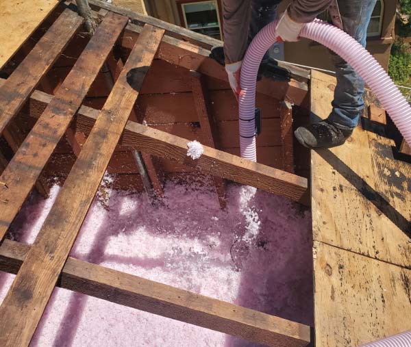 roof-insulation Skilled Astro Roofing professionals installing a new roof
