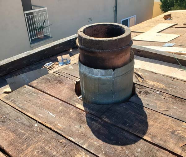 roof-top chimney being installed in an oakland, ca