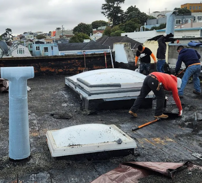 flat roof repair with skylight in oakland, ca
