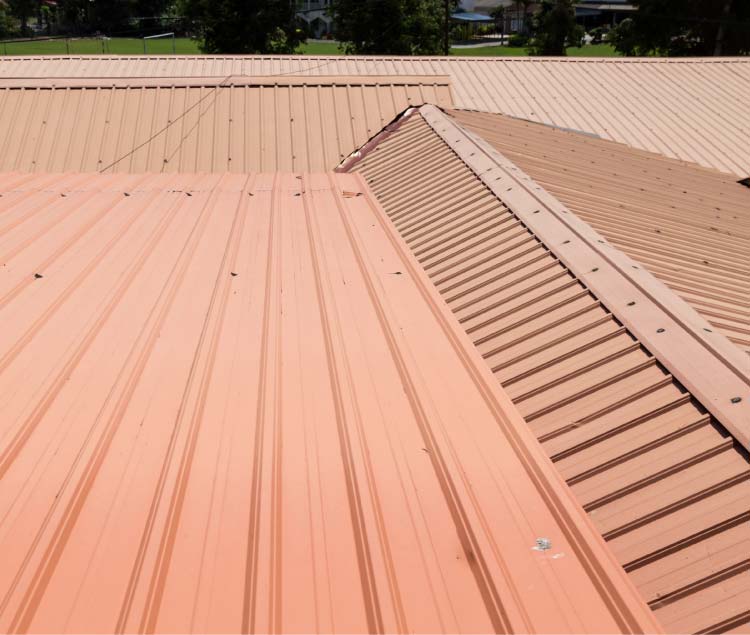 red and premium metal roofing installed
